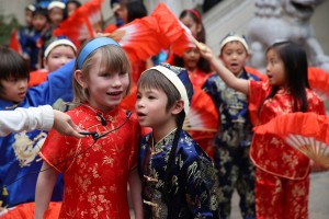 The american kids are playing for the shows that celebrating Chinese New Year